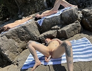 070524_cheri_deep_dildo_masturbation_on_risky_public_beach_rebeka_ruby_matty_background