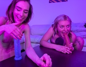 111925_poppy_and_brille_back_together_again_stripping_then_suck_and_fucking_big_dildos_on_a_table